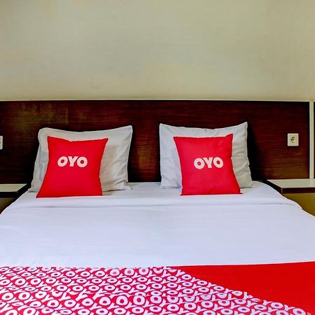 Oyo 90162 Remboelan Guest House Sungai Lutus ภายนอก รูปภาพ