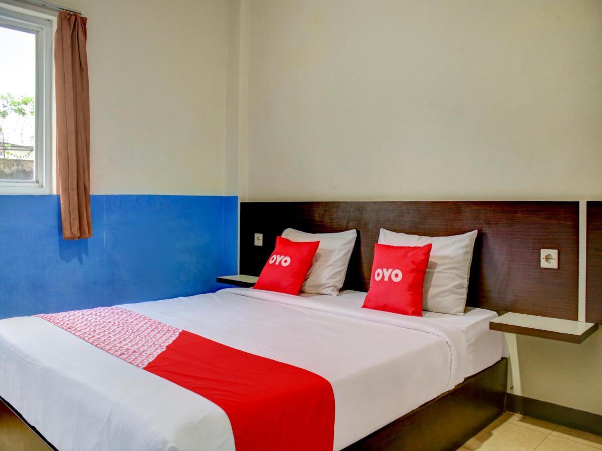 Oyo 90162 Remboelan Guest House Sungai Lutus ภายนอก รูปภาพ