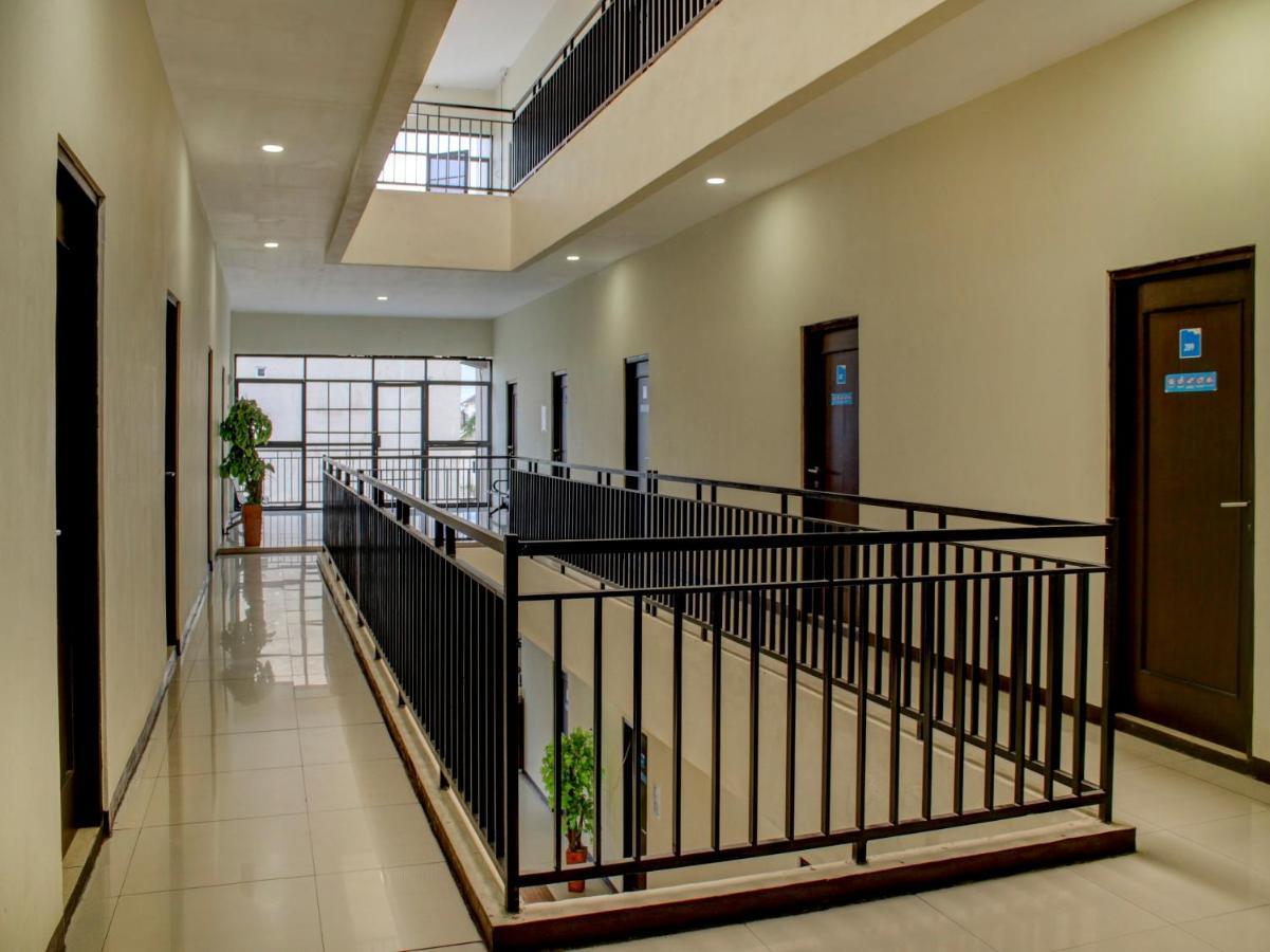 Oyo 90162 Remboelan Guest House Sungai Lutus ภายนอก รูปภาพ