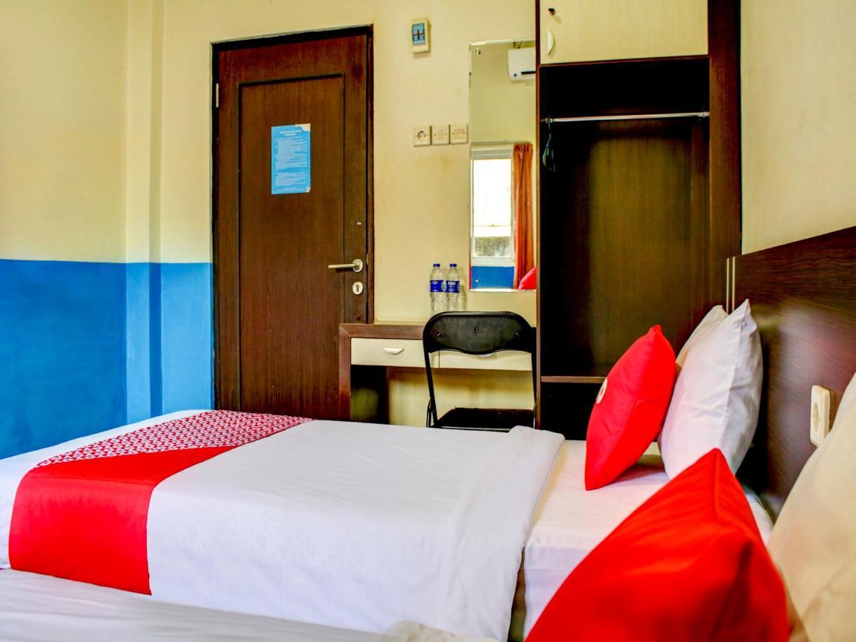 Oyo 90162 Remboelan Guest House Sungai Lutus ภายนอก รูปภาพ