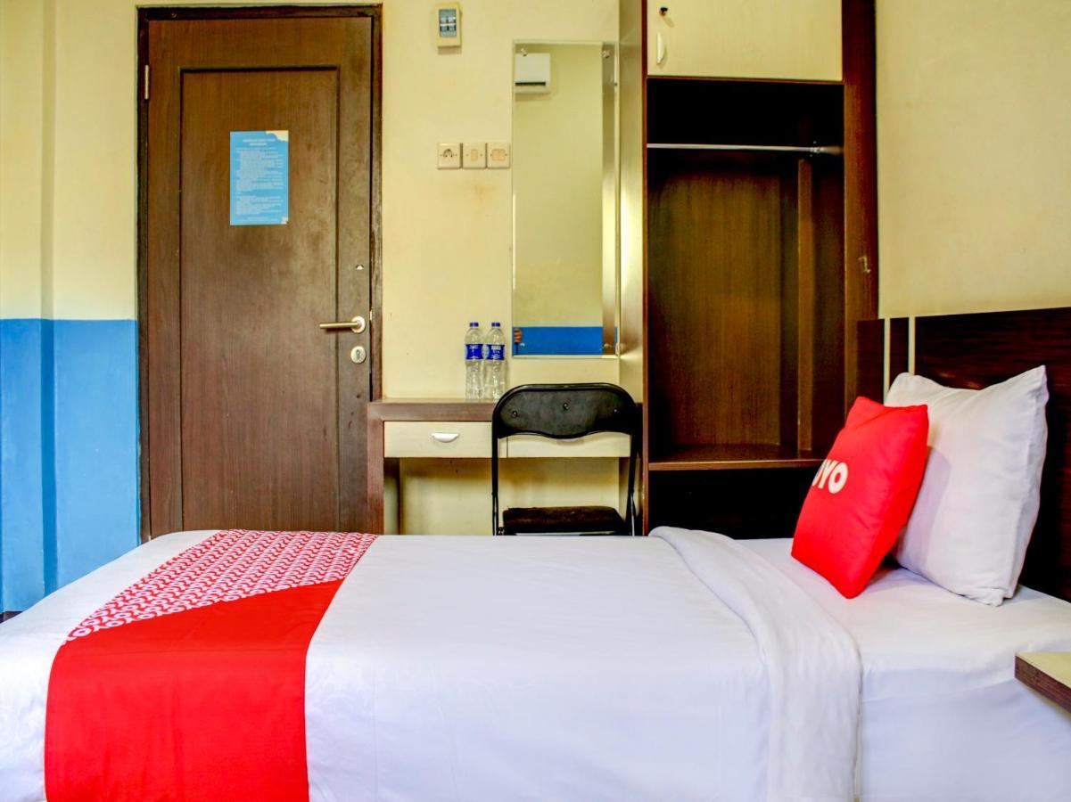 Oyo 90162 Remboelan Guest House Sungai Lutus ภายนอก รูปภาพ