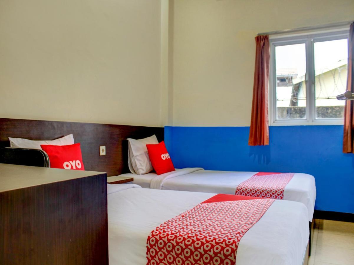 Oyo 90162 Remboelan Guest House Sungai Lutus ภายนอก รูปภาพ