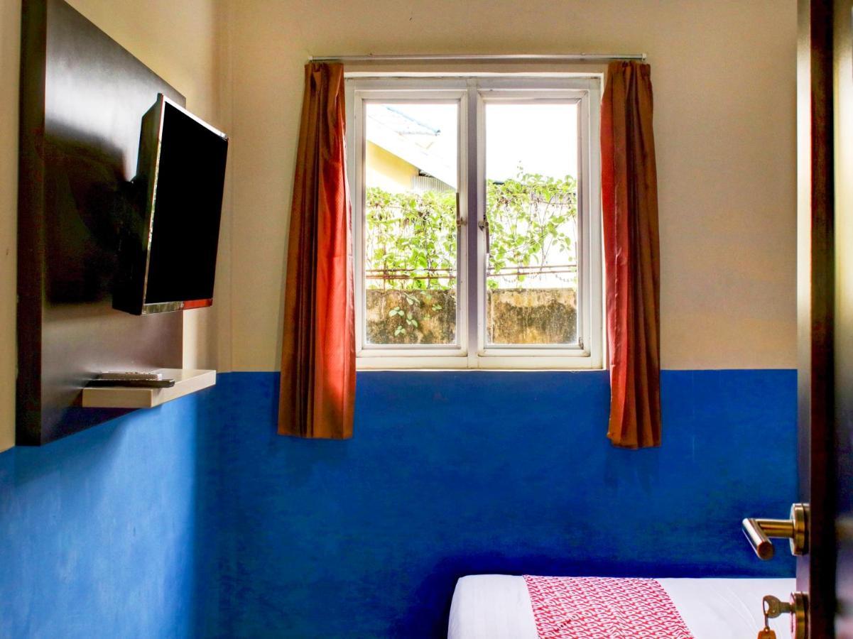 Oyo 90162 Remboelan Guest House Sungai Lutus ภายนอก รูปภาพ