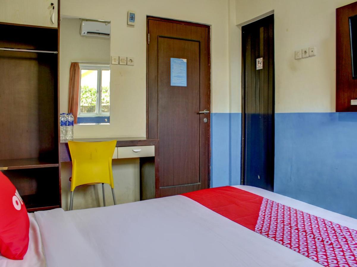 Oyo 90162 Remboelan Guest House Sungai Lutus ภายนอก รูปภาพ