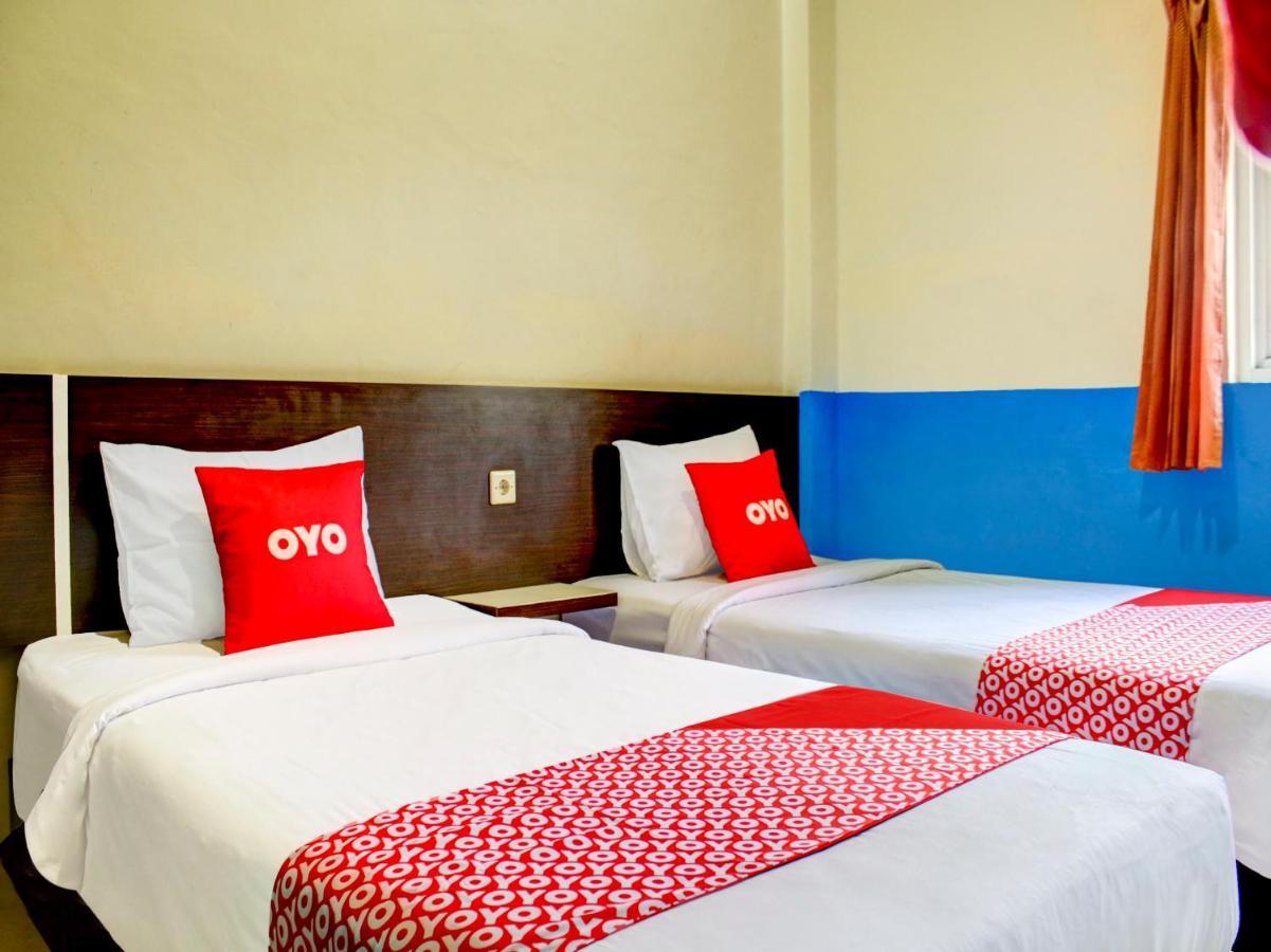 Oyo 90162 Remboelan Guest House Sungai Lutus ภายนอก รูปภาพ