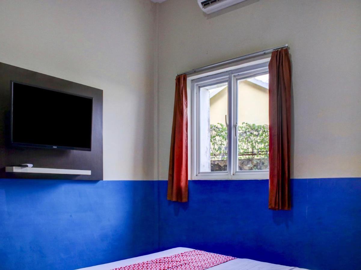 Oyo 90162 Remboelan Guest House Sungai Lutus ภายนอก รูปภาพ